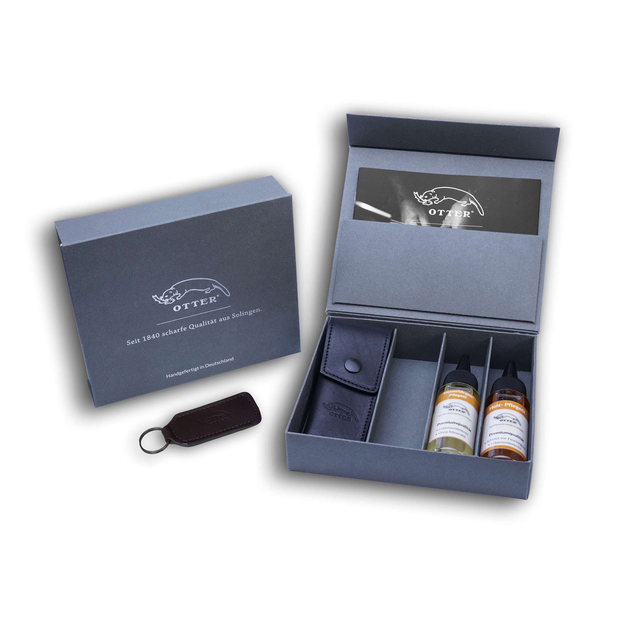 Geschenkbox mit Messerholster, Pflegeöle und Schlüsselanhänger. Geschenkbox mit Messerholster, Pflegeöle und Schlüsselanhänger.